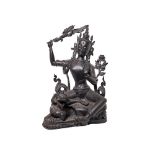 Escuela hindú, primera mitad del s.XX. Diosa Tara. Escultura en metal patinado. 55 x 38,5 x 36 cm.