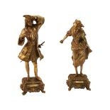 Escuela europea, ppios. del s.XX. Dama y caballero. Pareja de esculturas en bronce. Alts.: 21 y 22