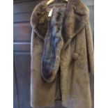 Synthetic fur coat and a fur stole