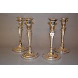 Set of four antique Sheffield plate candlesticks in Adam style (at fault)