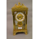 19th Century French gilt brass four glass two train mantel clock striking on a gong,