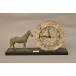 Art Deco marble black slate and patinated metal mantel clock in the form of a horse standing beside