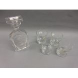 Modern etched glass decanter decorated with a sailing boat together with a set of four similar