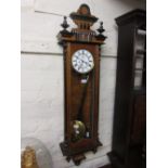Good quality late 19th Century figured walnut and ebonised cased Vienna style wall clock with a