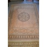 Modern machine woven rug with beige ground,