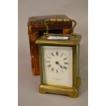 Mappin & Webb early 20th Century brass carriage clock with a single train movement and leather