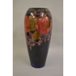 Large early 20th Century Moorcroft baluster form vase decorated in the Pomegranate and Grape