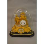 Gilt metal figural mantel clock in the form of a huntsman, the dial signed Prat a Chinon,