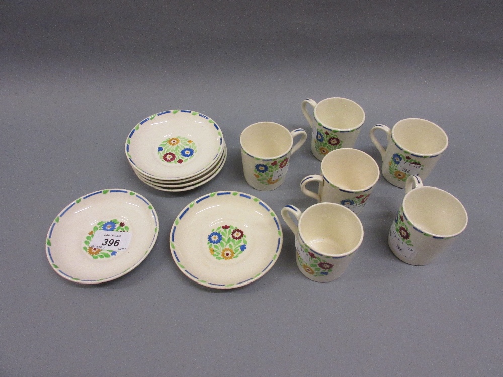 Set of six 1930's floral decorated coffee cans with saucers by Heal and Son in Country Bunch