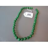 Modern uniform jadeite necklace with silver clasp