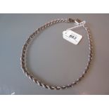 Modern silver necklace of woven design