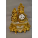 19th Century gilded spelter and alabaster figural mantel clock with a two train movement housed