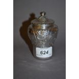 Small 19th Century Continental silver sugar caster embossed with panels of birds and cherubs