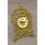 19th Century brass easel clock with enamel dial (at fault)