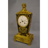 19th Century French Empire gilt and dark patinated bronze mantel clock,