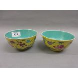 Pair of Chinese Republic period famille jaune bowls with oval printed seal marks to base