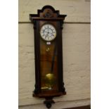 19th Century Continental walnut and part ebonised Vienna wall clock,