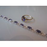 9ct Yellow gold and blue stone set ring together with a similar silver bracelet