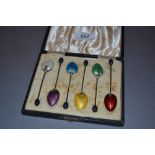 Cased set of six Birmingham silver and enamel decorated coffee spoons CONDITION REPORT