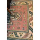 Two machine woven Turkish style rugs,