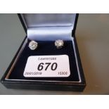 Pair of 18ct white gold screw back diamond set stud earrings, approximately 2.