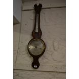 George III mahogany and inlaid wheel barometer with silvered dials, signed Lione and Co.