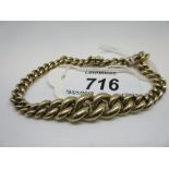 Yellow metal graduated curb link bracelet (probably adapted from a watch chain) CONDITION