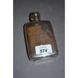 Early 20th Century Sheffield silver hip flask with integral hinged cover engraved with the initials