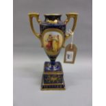 Late 19th Century Vienna porcelain two handled baluster form pedestal vase and plinth painted with