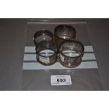 Four various silver napkin rings