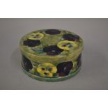 Early 20th Century Moorcroft circular box and cover decorated with the Pansy design on a mottled