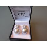 Pair of 18ct white gold South Sea pearl and diamond drop earrings,