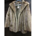 Ladies mid brown half length fur jacket,