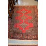 Small mid to late 20th Century Senneh rug with a triple pole medallion on a red ground and Herati