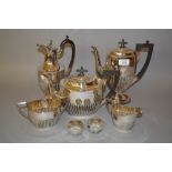 Silver plated four piece teaset with half gadroon decoration,