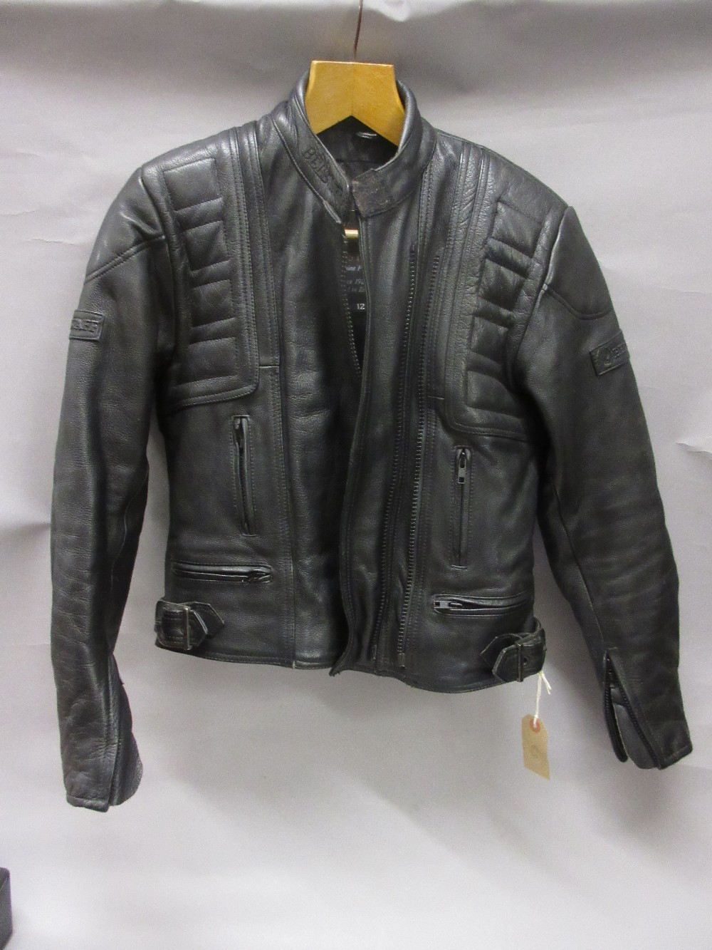 Ladies Belstaff leather motorcycling jacket together with a child's Charles and Owen riding helmet