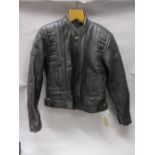 Ladies Belstaff leather motorcycling jacket together with a child's Charles and Owen riding helmet