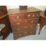 Small 18th Century oak straight front chest of two short and three long drawers with brass handles