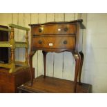 Early 20th Century mahogany two drawer side table on cabriole supports together with a small