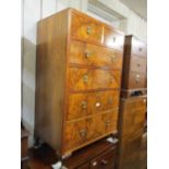 1930's Figured walnut straight front chest of two short and four long graduated drawers with brass