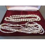 Single row uniform cultured pearl necklace together with a freshwater pearl necklace