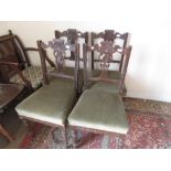 Set of four late Victorian carved walnut dining chairs together with a pair of wheel back dining