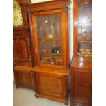 19th Century walnut bookcase the moulded cornice with carved applied frieze above a single glazed