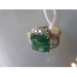 18ct Yellow gold, emerald and diamond ring, the emerald of approximately 4.