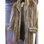 Ladies three quarter length fur coat labelled Dickins & Jones,