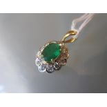 18ct Yellow gold emerald and diamond pendant, the emerald approximately 1.