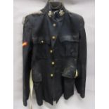 Blue / black military tunic having chain mail epaulettes with brass buttons,