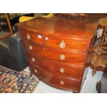 Small early 19th Century mahogany bow fronted chest of two short and three long drawers with