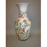 19th Century Chinese polychrome enamel decorated baluster form vase decorated with figures around a