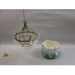 Gilt brass and cut glass four tier hanging light fitting together with a pottery floral decorated